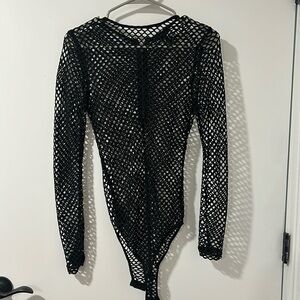Forever 21 Black Fishnet long sleeve bodysuit. Size Medium. Worn once.